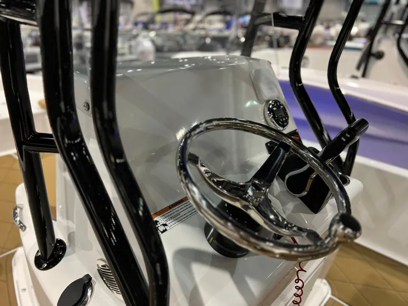 Slide: The Image of Close-up of 2024 Clearwater 2100 Baystar boat steering console. - 8