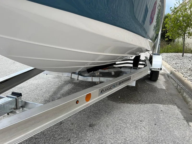 Slide: The Image of 2024 Clearwater 2100 Baystar boat on a trailer, close-up view. - 23