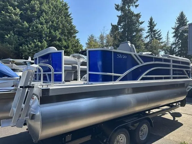 Slide: The Image of 2024 Bennington 20 SVL 3 SPS pontoon boat on trailer, side view. - 2