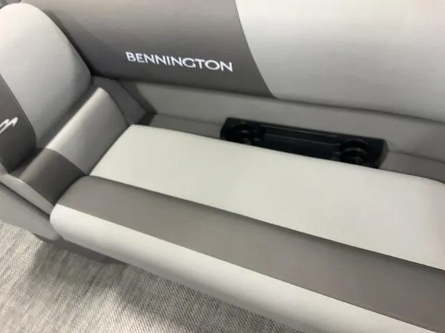 Slide: The Image of 2024 Bennington 20 SVL 3 SPS boat seat with cup holders. - 20