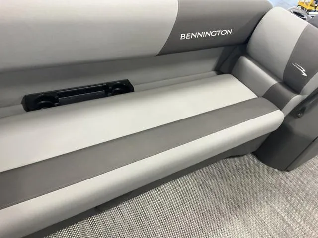 Slide: The Image of 2024 Bennington 20 SVL 3 SPS boat interior seating with cup holders. - 21