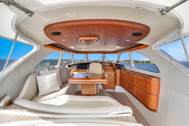 Slide: The Image of Luxurious interior of 2012 Zeelander 44 yacht with elegant wood finishes and panoramic windows. - 6