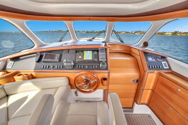 Slide: The Image of Cockpit of 2012 Zeelander 44 yacht with wooden dashboard and leather seating. - 7