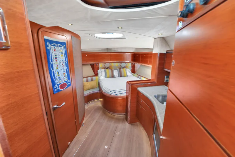 Slide: The Image of Luxurious interior of 2012 Zeelander 44 yacht with wood finish and cozy bedroom. - 8