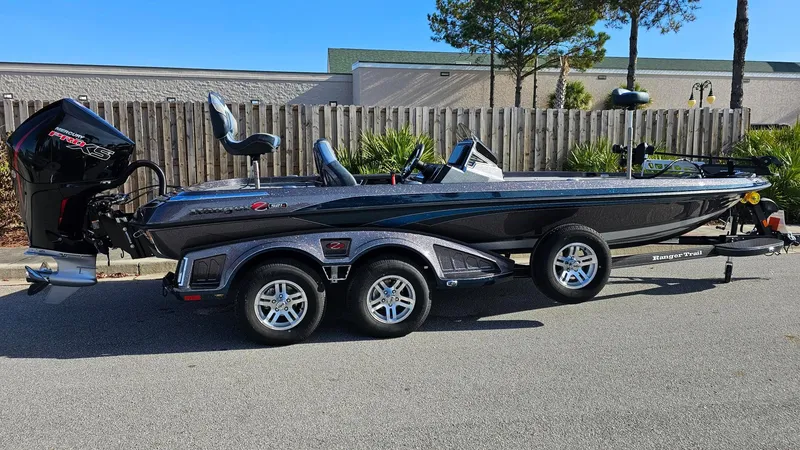 The Image of 2024 Ranger Z521R bass boat on a trailer, side view. - 0