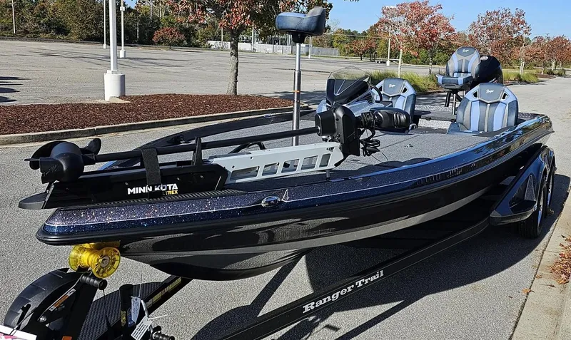 Slide: The Image of 2024 Ranger Z521R fishing boat in parking lot with Minn Kota trolling motor. - 7