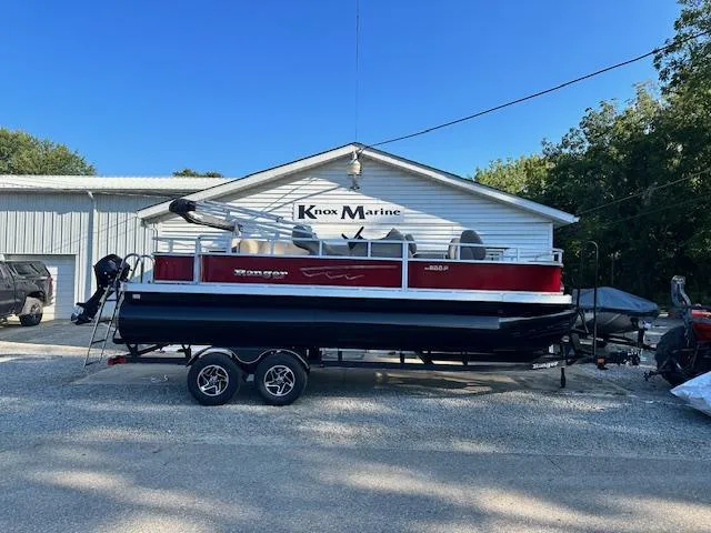 Slide: The Image of 2024 Ranger RP200F pontoon boat at Knox Marine dealership. - 1