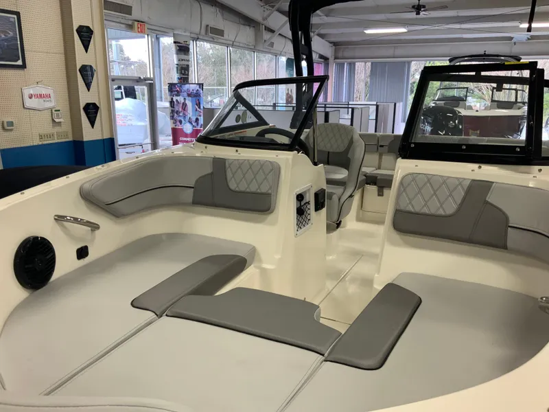 Slide: The Image of 2024 Bayliner VR4 Bowrider OB interior with gray seating and modern design. - 4