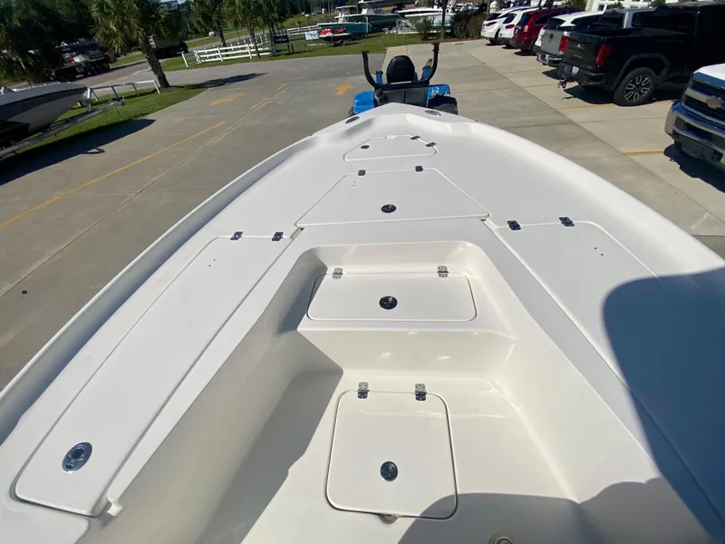 Slide: The Image of 2024 Key West 230 Bay Reef boat deck with storage compartments. - 22