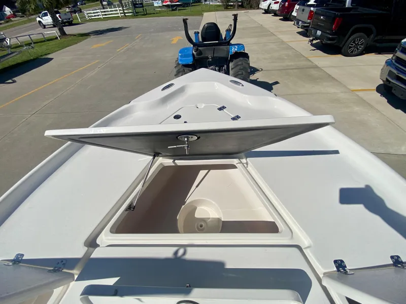 Slide: The Image of 2024 Key West 230 Bay Reef boat with open storage compartment. - 24