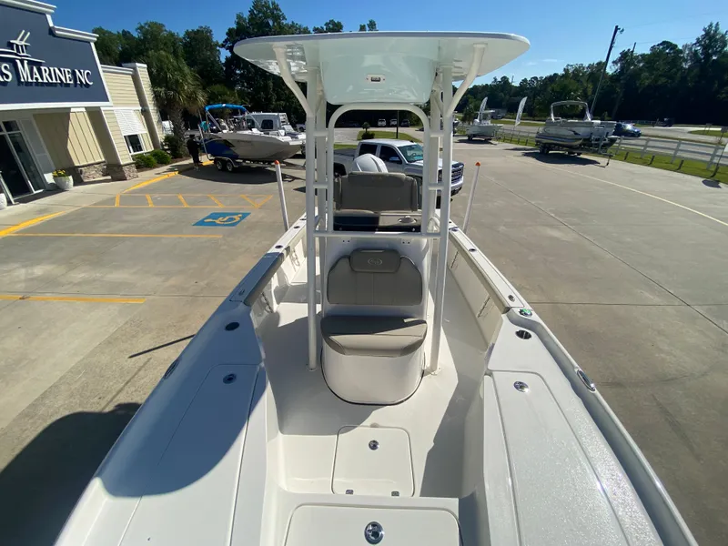 Slide: The Image of 2024 Key West 230 Bay Reef boat at a dealership. - 29