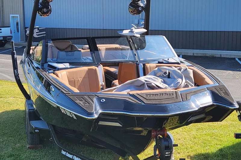 Slide: The Image of 2021 Malibu Wakesetter 24 MXZ boat with sleek design and spacious interior. - 21