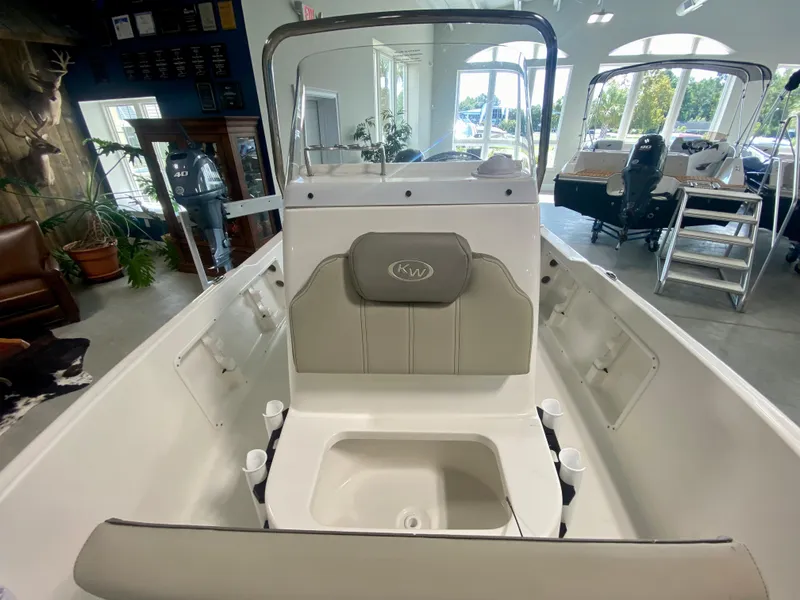Slide: The Image of 2024 Key West 1720 CC center console boat interior in showroom. - 11