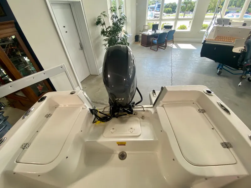 Slide: The Image of 2024 Key West 1720 CC boat with outboard motor in showroom. - 6