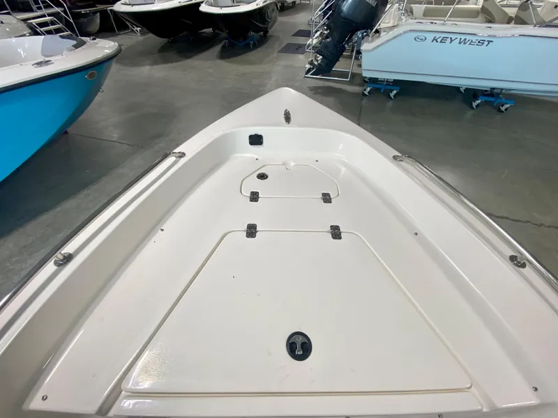 Slide: The Image of 2024 Key West 1720 CC boat bow view in showroom. - 15