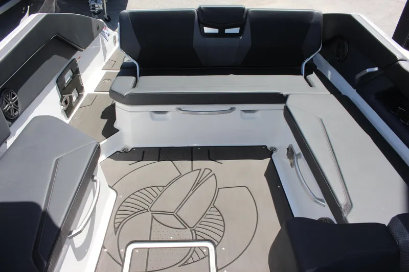 Slide: The Image of 2023 Scarab 285 ID boat interior with black and white seating. - 14