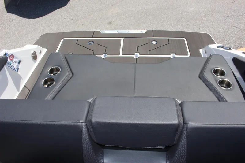 Slide: The Image of 2023 Scarab 285 ID boat rear seating and deck with cup holders. - 15