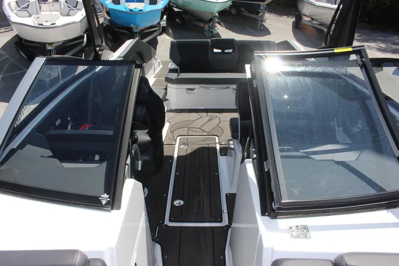 Slide: The Image of 2023 Scarab 285 ID boat interior with seating and windshield. - 6