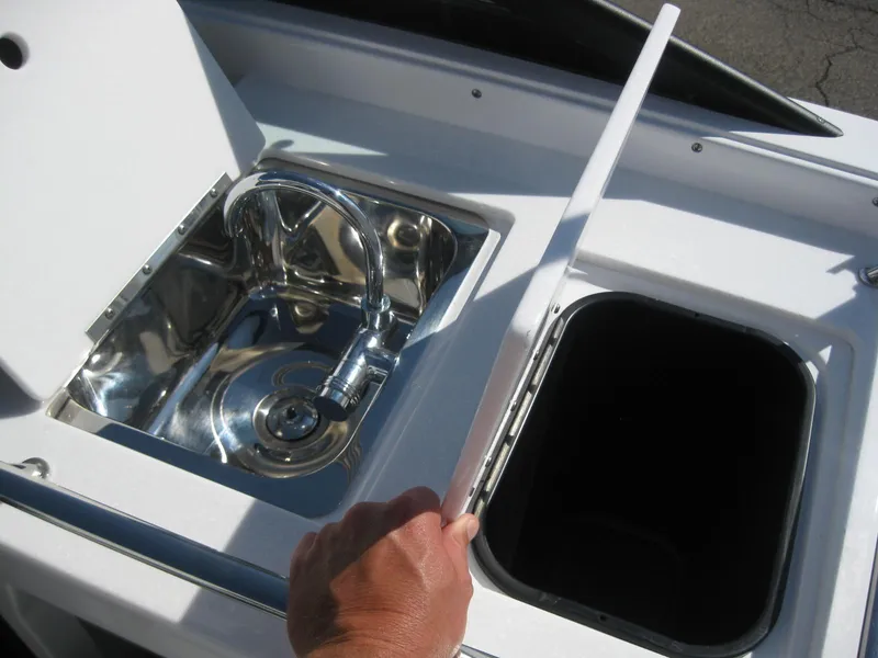 Slide: The Image of 2024 Monterey 258SS Super Sport boat kitchenette with sink. - 15
