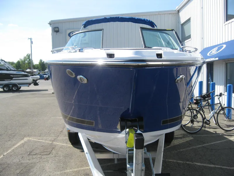 Slide: The Image of 2024 Monterey 258SS Super Sport boat, blue, on a trailer. - 3