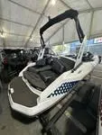 Slide: The Image of 2023 Scarab 165 ID boat displayed in a showroom. - 3