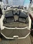 Slide: The Image of 2023 Scarab 165 ID boat interior with seating and dashboard. - 6