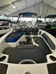 Slide: The Image of 2023 Scarab 165 ID boat interior under a canopy. - 7