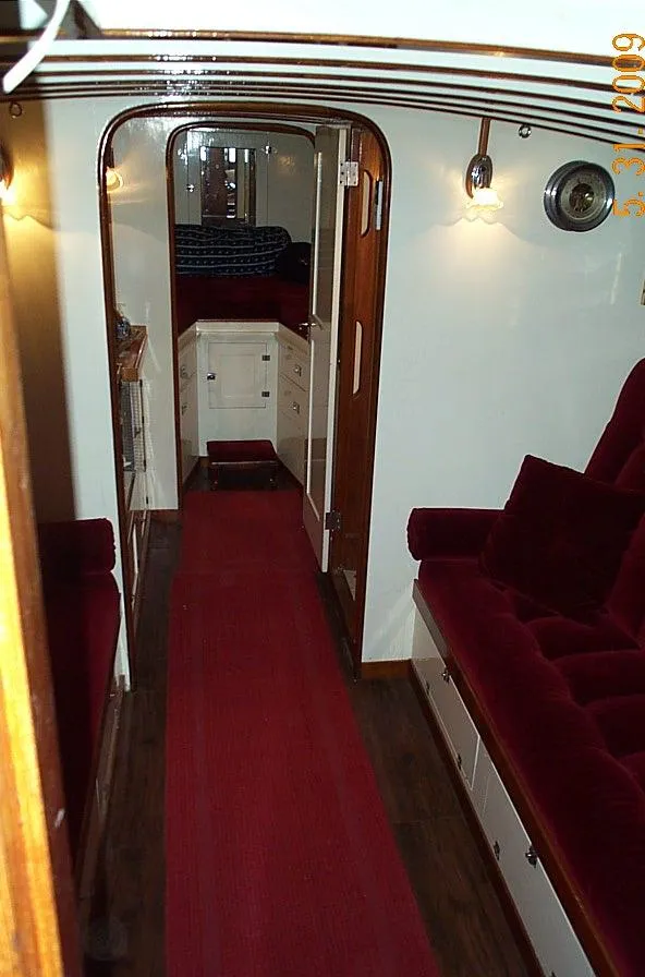 Slide: The Image of Interior of 1930 Blanchard Lake Union Dreamboat with red carpet and plush seating. - 15