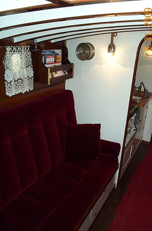 Slide: The Image of 1930 Blanchard Lake Union Dreamboat interior with red velvet seating and vintage decor. - 16