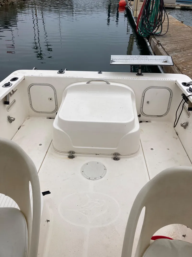 Slide: The Image of 2003 Trophy 2052 Walkaround boat interior at dock. - 12
