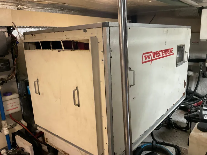 Slide: The Image of Westerbeke generator in 1999 Sea Ray 560 Sedan Bridge engine room. - 25