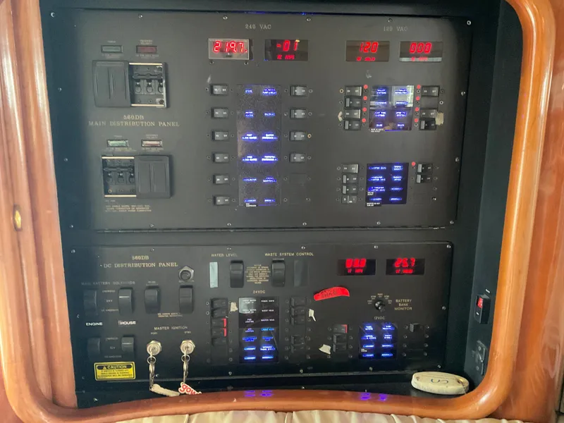Slide: The Image of Electrical control panel on a 1999 Sea Ray 560 Sedan Bridge yacht. - 7