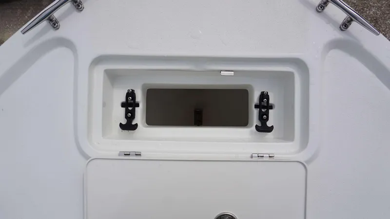Slide: The Image of Parker 1801 CS 2024 boat storage compartment with latches and stainless steel hardware. - 5
