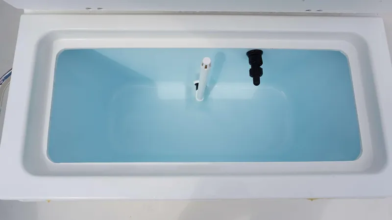 Slide: The Image of Parker 1801 CS 2024 model livewell with blue interior and white exterior. - 6