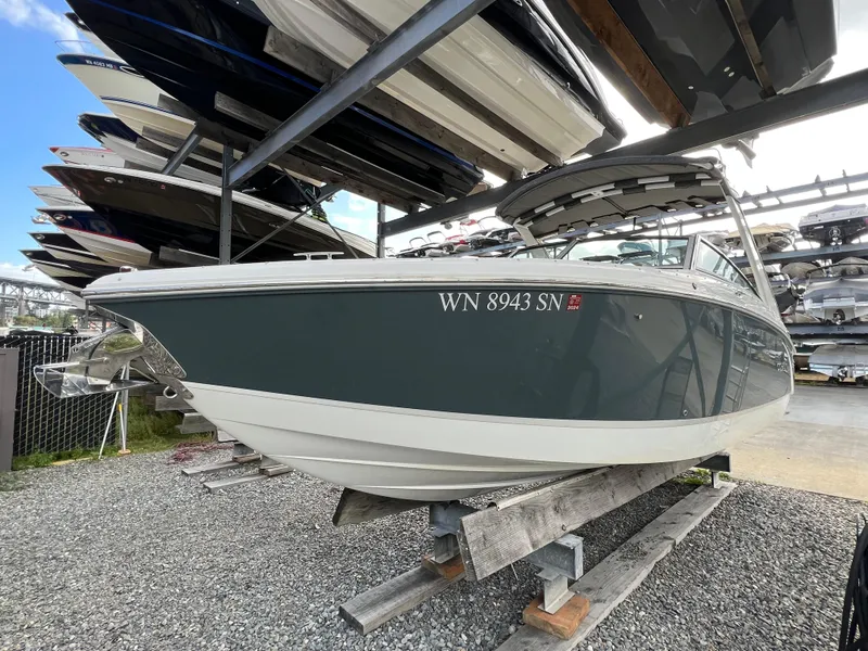 Slide: The Image of 2018 Cobalt R5 boat on dry dock, surrounded by other stored boats. - 20