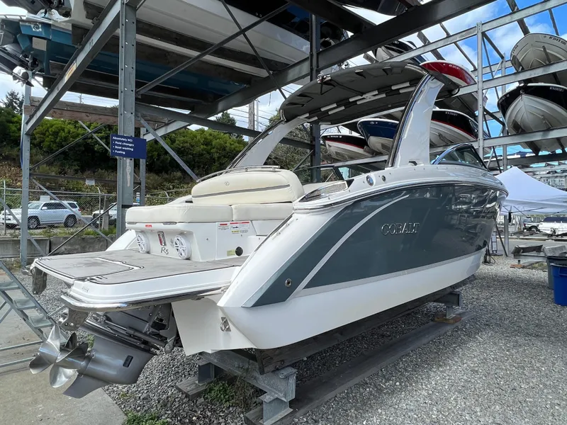 Slide: The Image of 2018 Cobalt R5 boat in storage, showcasing sleek design and modern features. - 23