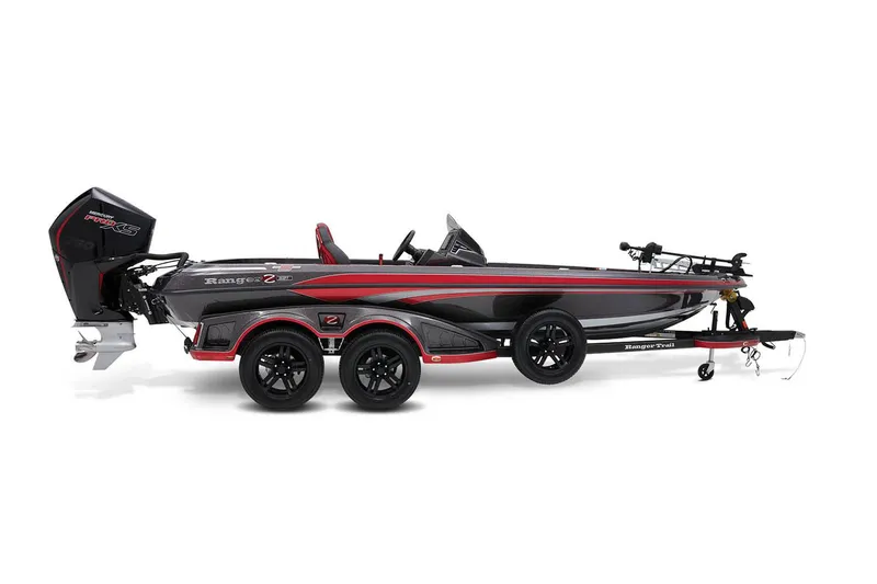 Slide: The Image of 2024 Ranger Z521R boat on trailer, parked outdoors, featuring sleek red and black design. - 3