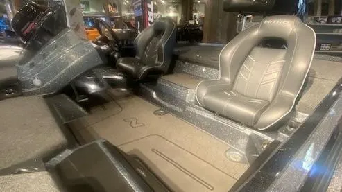 Slide: The Image of 2024 Nitro Z21 XL Pro boat interior with sleek seating and modern design. - 2