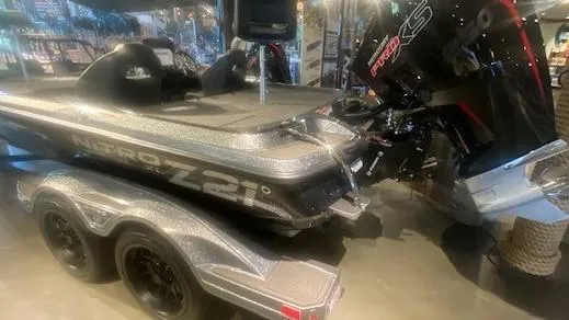 Slide: The Image of 2024 Nitro Z21 XL Pro boat with powerful engine on display. - 3