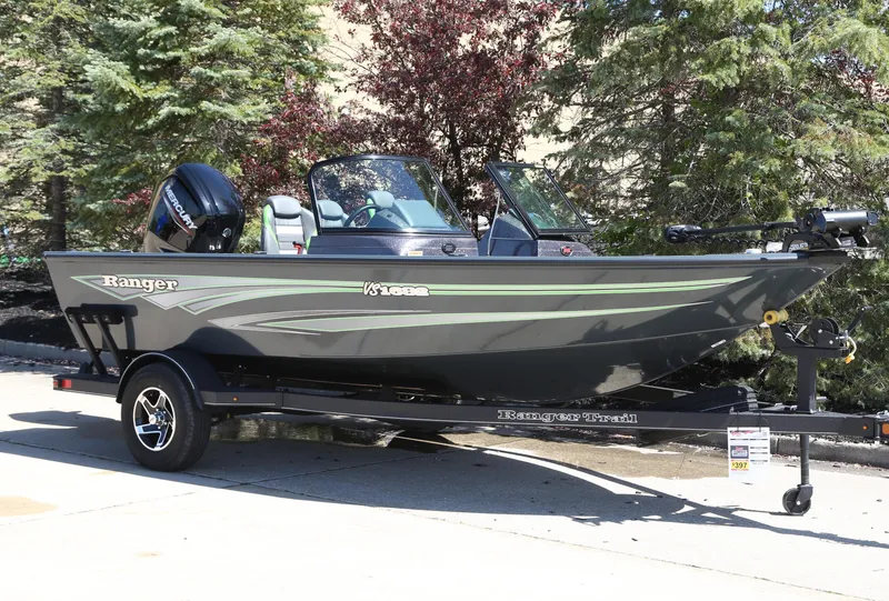 The Image of 2024 Ranger VS1682SC Angler boat on trailer, parked outdoors. - 0