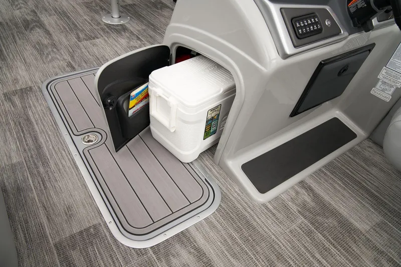 Slide: The Image of 2024 Ranger Reata 223F storage compartment with cooler and accessories. - 27