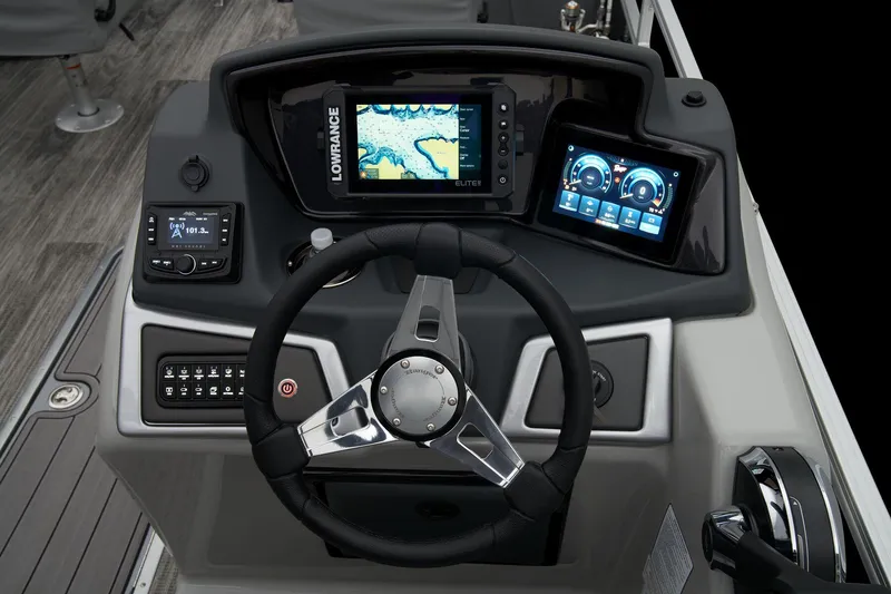 Slide: The Image of 2024 Ranger Reata 223F boat dashboard with advanced navigation and control systems. - 30
