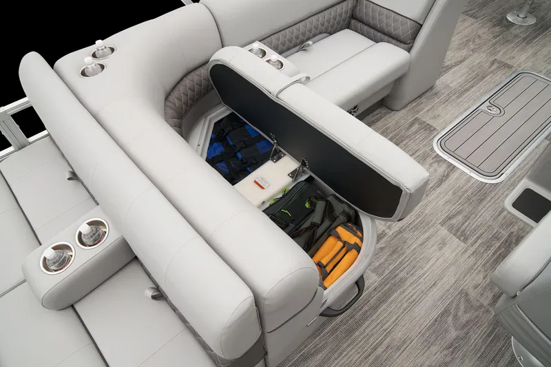 Slide: The Image of 2024 Ranger Reata 223F boat interior with open storage compartment. - 46