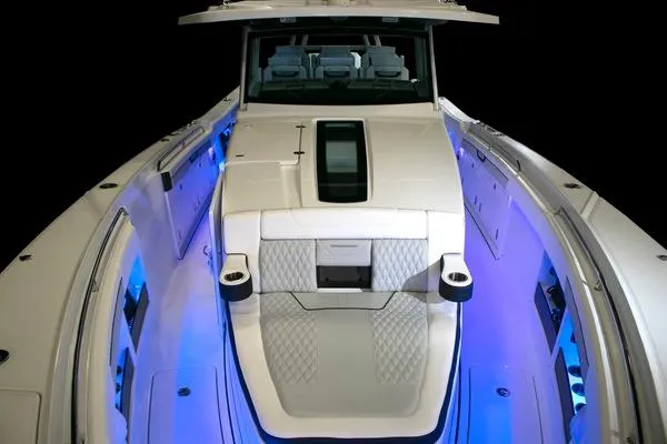 Slide: The Image of 2024 Blackfin 400 CC boat deck with sleek white design. - 20