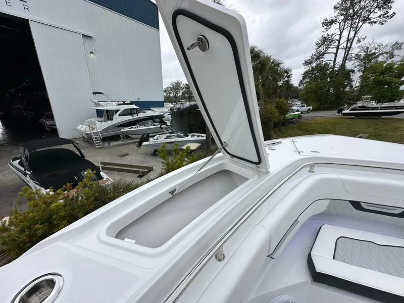 Slide: The Image of 2024 Blackfin 400 CC boat interior with blue LED lighting. - 24