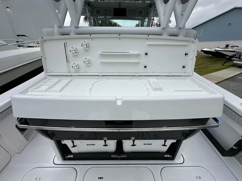 Slide: The Image of 2024 Blackfin 400 CC boat with four Mercury outboard engines on the water. - 37