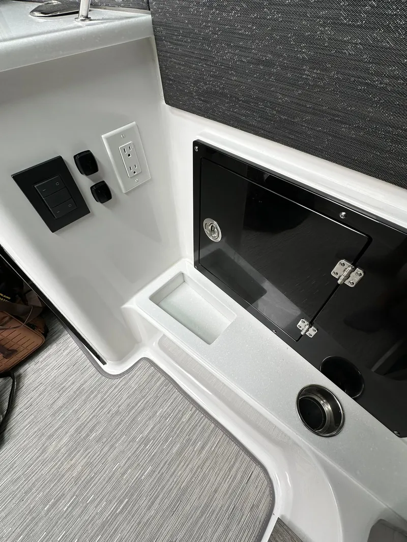 Slide: The Image of 2024 Blackfin 400 CC cabin interior with modern seating and storage. - 50