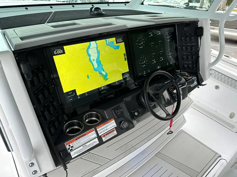 Slide: The Image of 2024 Blackfin 400 CC boat with Mercury engines on display. - 6