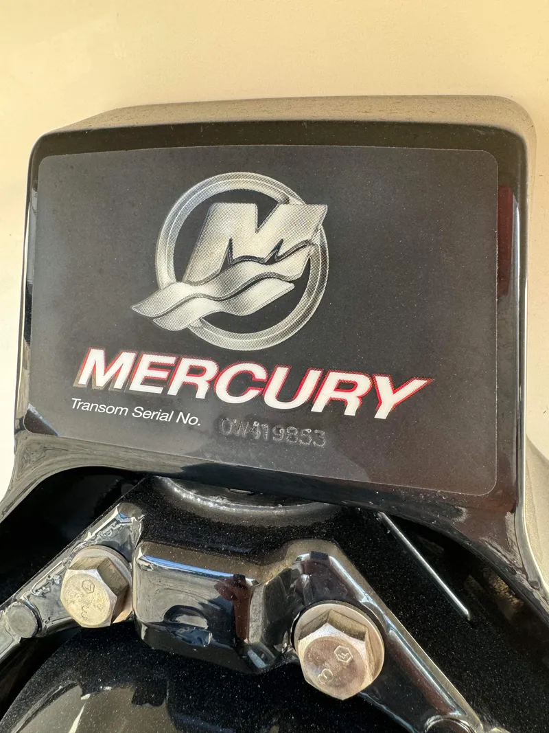 Slide: The Image of Mercury engine part with transom serial number on a 2005 Sea Ray 180 Sport boat. - 34
