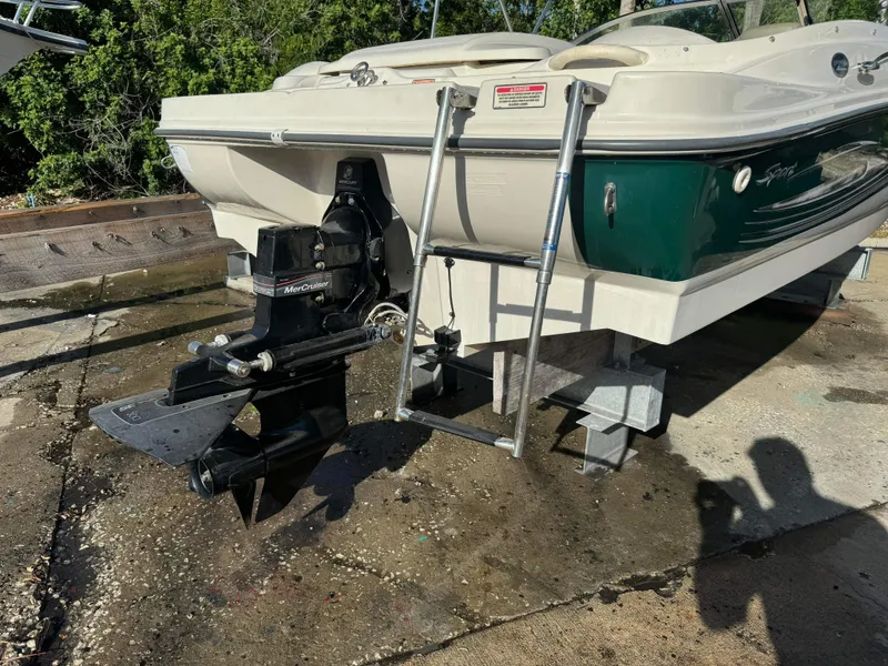 Slide: The Image of 2005 Sea Ray 180 Sport boat with MerCruiser engine on a trailer. - 37